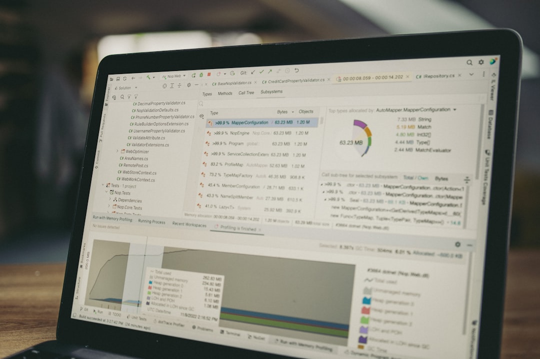 laptop-screen-displaying-code-and-data-charts-gqoylin892u